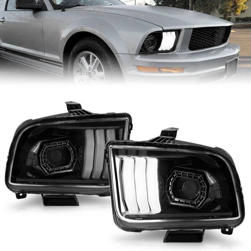 ANZO 05-09 Ford Mustang (w/Factory Halogen HL Only) Projector Headlights w/Light Bar Black Housing - Mammoth Racing -