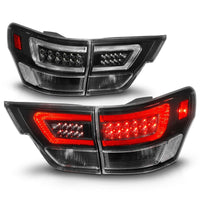 ANZO 11-13 Jeep Grand Cherokee LED Taillights w/ Lightbar Black Housing/Clear Lens 4pcs - Mammoth Racing -
