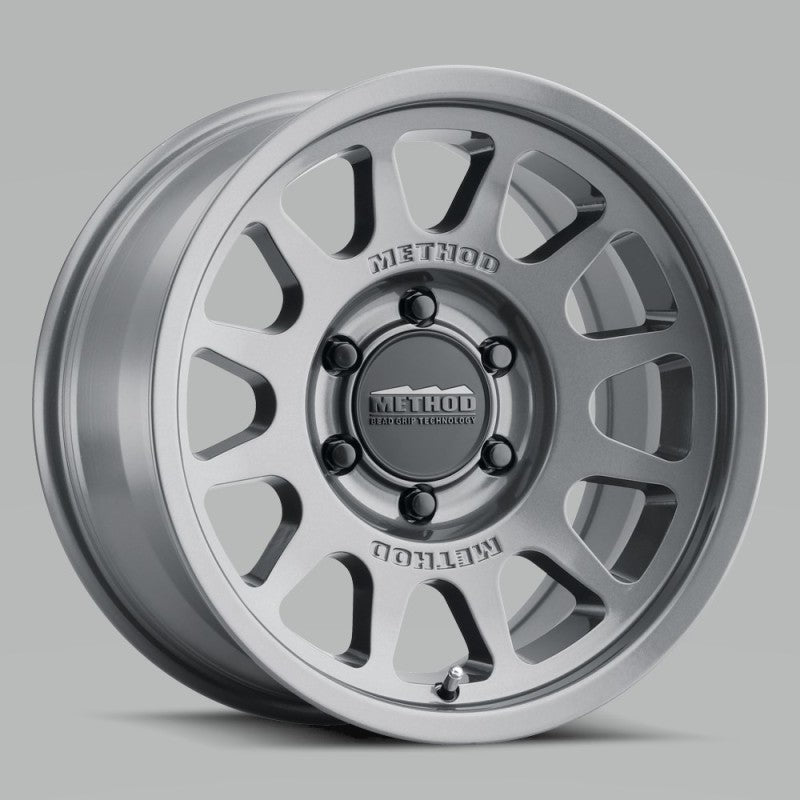 Method Mr703 15x7 +15mm Offset 5x100 56.1mm CB Gloss Titanium Wheel - Mammoth Racing -