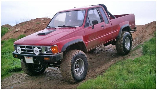 Bushwacker 84-88 Toyota Extend-A-Fender Style Flares 4pc Compatible w/ Domestic Bed - Black - Mammoth Racing -