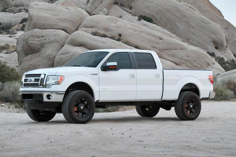 Fabtech 09-13 Ford F150 4WD 4in Perf Sys w/Dlss 2.5 C/O Resi & Rr Dlss - Mammoth Racing -