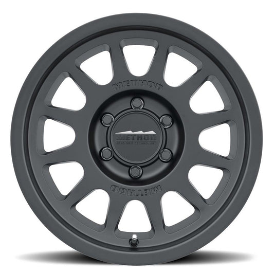 Method Mr703 16x6.5 +90mm Offset 6x180 138.9mm CB Gloss Matte Black Wheel