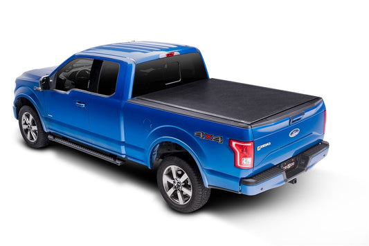 Truxedo 05-15 Nissan Navara w/Rack 4ft 10in Lo Pro International Bed Cover - My Store